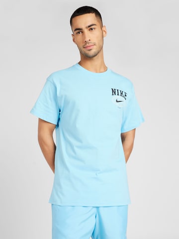 Nike Sportswear - Camisa em azul: frente