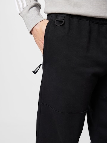 ADIDAS ORIGINALS Tapered Trousers 'Adventure' in Black