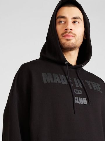 ABOUT YOU Bluzka sportowa 'Malik Hoodie' w kolorze czarny