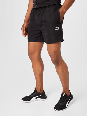 PUMA Regular Pants in Black: front