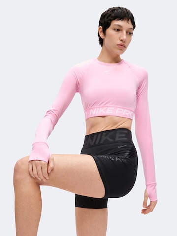 Skinny Pantalon de sport NIKE en noir