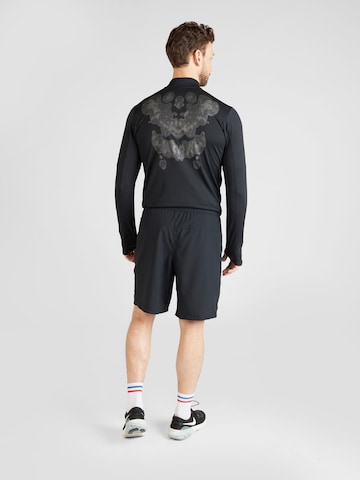 NIKE Regular Sportshorts 'FORM 9IN' in Schwarz