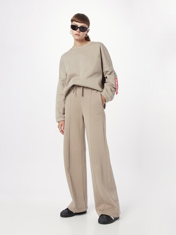 ALPHA INDUSTRIES Wide leg Trousers in Beige