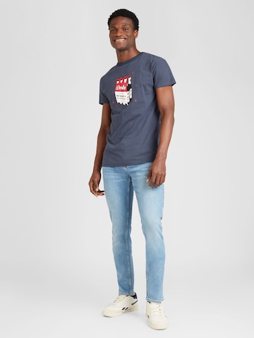 Derbe - Camiseta 'Herrenhandtasche' en azul