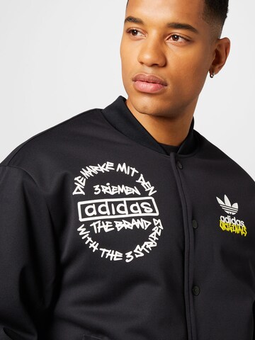 ADIDAS ORIGINALS Overgangsjakke 'Graphics Unite ' i svart