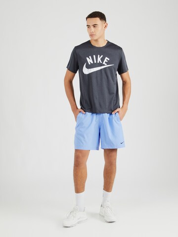 regular Pantaloni sportivi 'FORM' di NIKE in blu