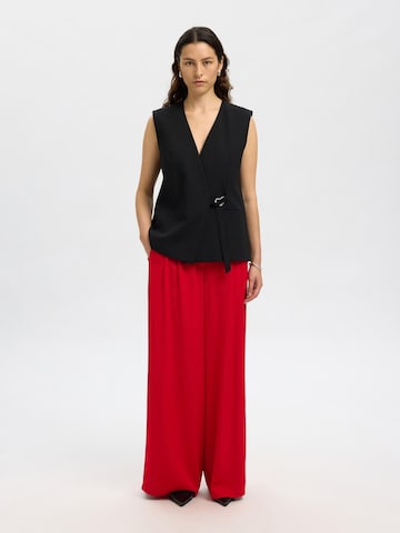 Wide leg Pantaloni di SELECTED in rosso