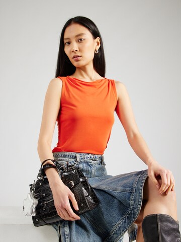 Monki Top – oranžová: přední strana