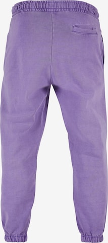Karl Kani Zwężany krój Spodnie w kolorze fioletowy