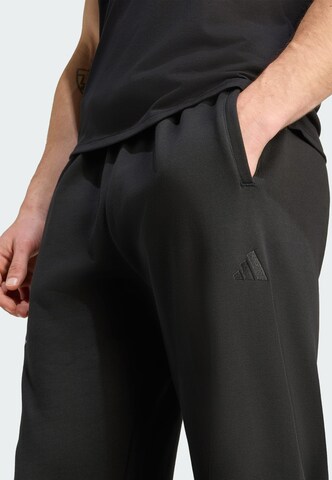 melns ADIDAS PERFORMANCE Pakapēniski sašaurināts piegriezums Sporta bikses 'Adidas x Jeremy Scott'