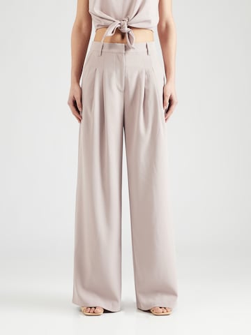 ABOUT YOU x Iconic by Tatiana Kucharova Loose fit Pleat-Front Pants 'Mathilda' in Beige: front