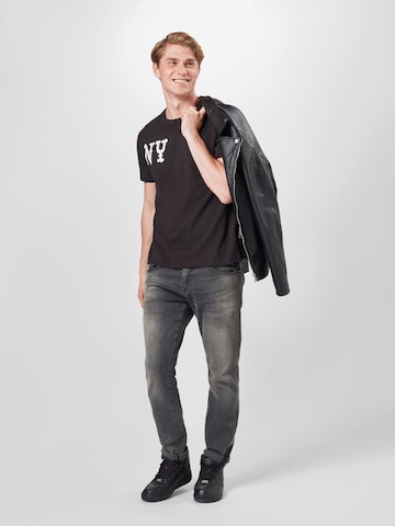 Champion Reverse Weave - Ajuste regular Camiseta en negro