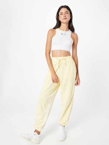 ADIDAS SPORTSWEAR Tapered Sports trousers 'Hyperglam 3-Stripes Cuffed With Side s' in Yellow