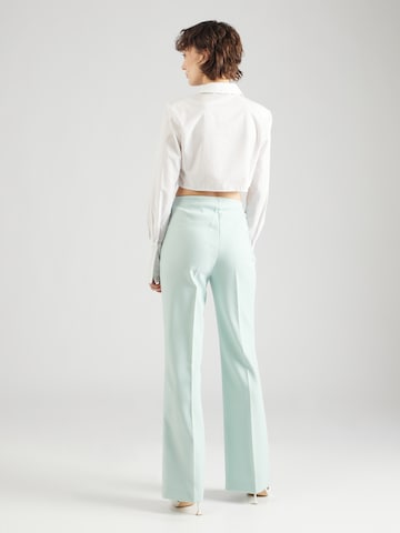 SOAKED IN LUXURY Flared Pleated Pants 'Corinne' in Green