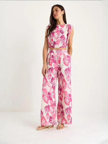 Pantalons de tailleur Bianco Lucci en rose