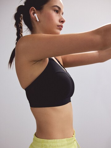 Bustino Reggiseno sportivo 'Zero Bounce' di Next in nero