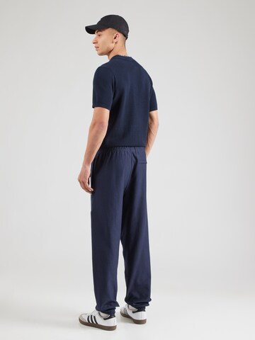 Calvin Klein Jeans Дънки Tapered Leg Панталон в синьо