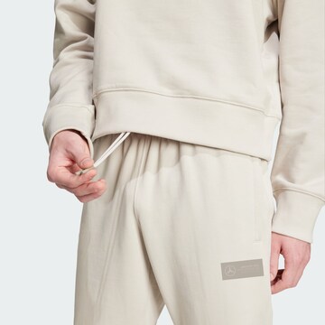 Loosefit Pantalon de sport 'MERCEDES - AMG PETRONAS FORMULA ONE TEAM PREMIUM' ADIDAS PERFORMANCE en beige