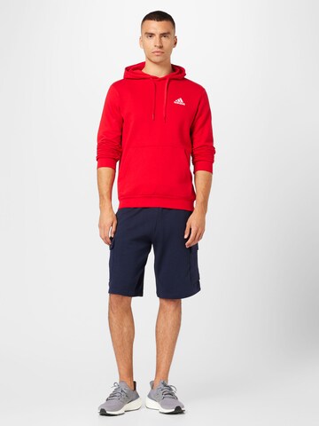 sarkans ADIDAS SPORTSWEAR Sportiska tipa džemperis 'Essentials'