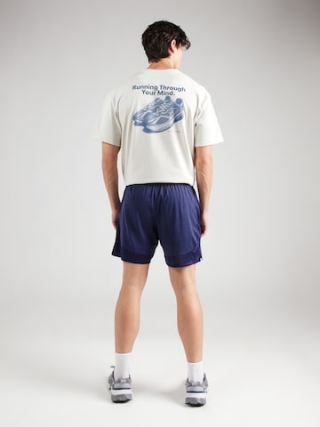 UNDER ARMOUR Regular Sports trousers in Blue
