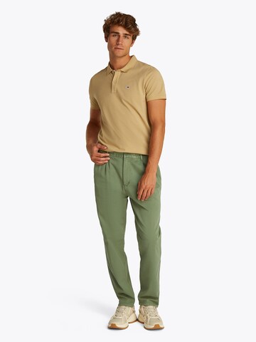 Tapered Pantaloni con pieghe di Tommy Jeans in verde