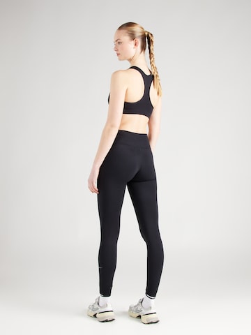 NIKE Skinny Sporthose 'ONE' in Schwarz