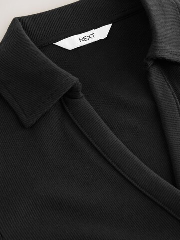 Tricou de la Next pe negru