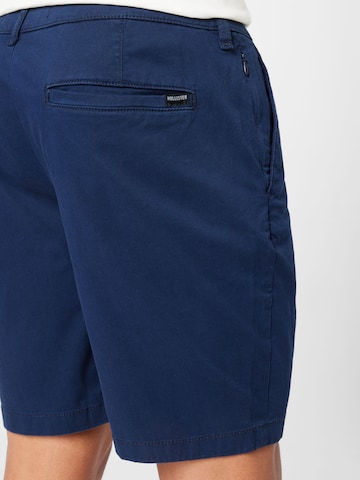 HOLLISTER - Regular Calças chino em azul