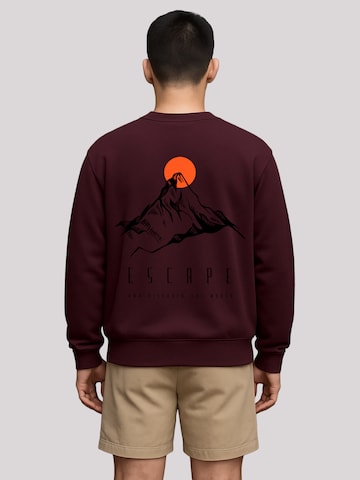 Sweat-shirt 'Escape Discover The World Mountain' F4NT4STIC en violet : devant