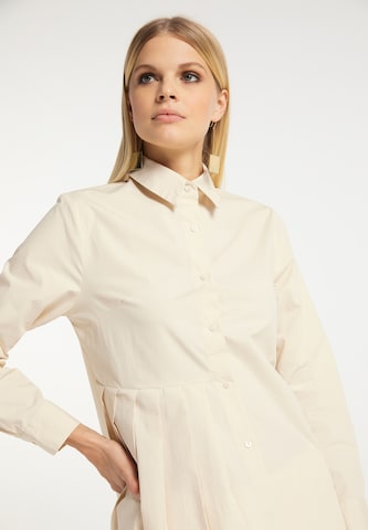 RISA - Blusa en beige