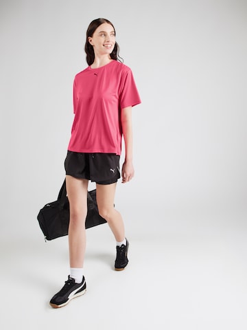 PUMA Toiminnallinen paita 'TAD ESSENTIAL' värissä vaaleanpunainen