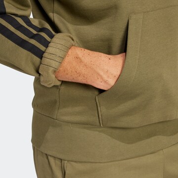 ADIDAS SPORTSWEAR Αθλητική μπλούζα φούτερ 'Essentials' σε πράσινο