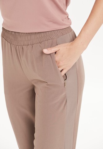 Athlecia Regular Sportbroek 'Timmie' in Beige