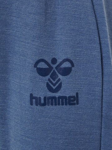 Effilé Pantalon de sport Hummel en bleu