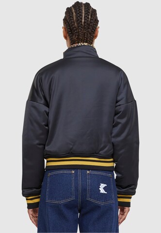 Karl Kani Jacke 'Varsity' in Schwarz