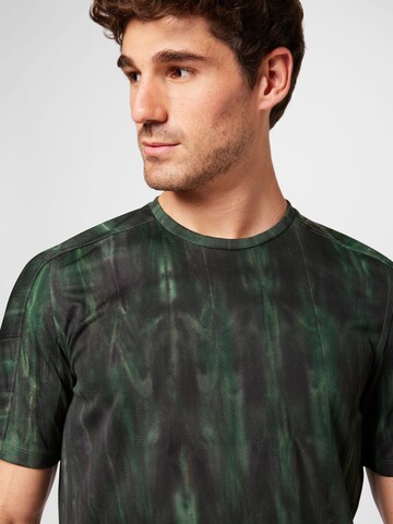 ADIDAS SPORTSWEAR - Camiseta funcional 'Overspray Graphic' en verde