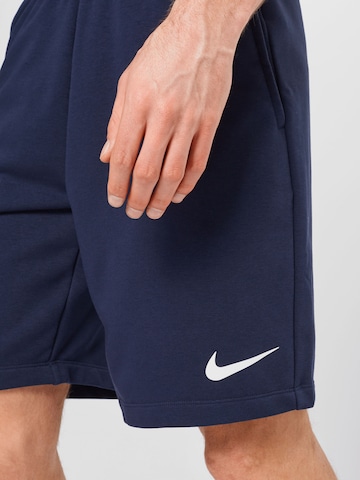 NIKE Normální Sportovní kalhoty – modrá