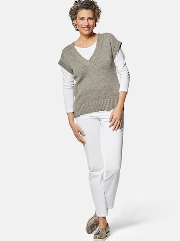 Goldner Strickweste in Grün