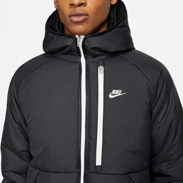 Nike SportswearPrijelazna jakna - crna boja