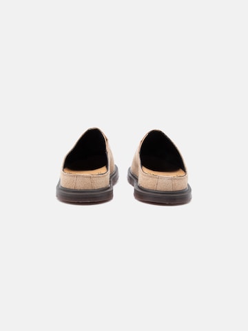 Dr. Martens Pistokkaat 'San' värissä beige