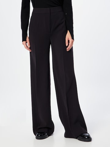 Wide leg Pantaloni con pieghe di Calvin Klein in nero: frontale