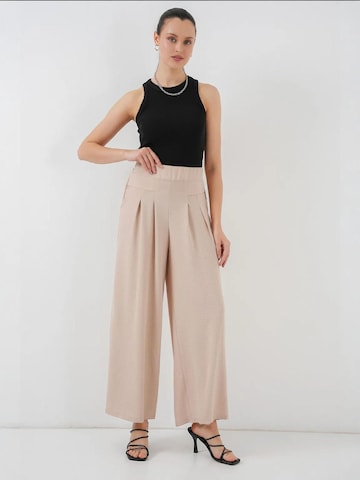 Wide leg Pantaloni con pieghe di Bigdart in beige