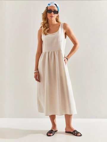 Bianco Lucci Dress in Beige: front