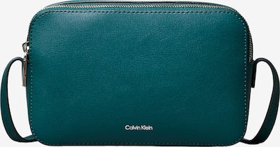 Rankinė su ilgu dirželiu iš Calvin Klein, spalva – benzino spalva, Prekių apžvalga