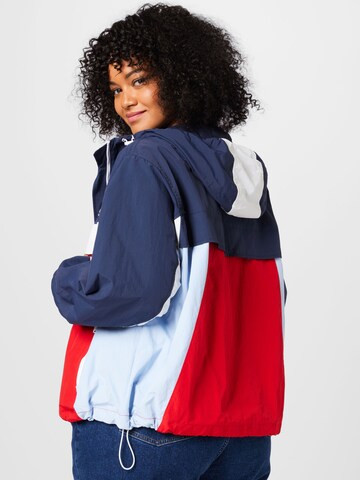 Tommy Jeans Curve Between-Season Jacket 'CHICAGO' in Blue
