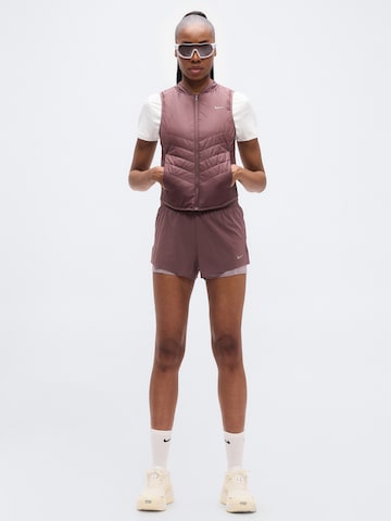 Loosefit Pantalon de sport 'SWIFT' NIKE en rouge