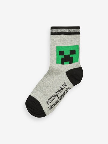 Next Sockor i grå