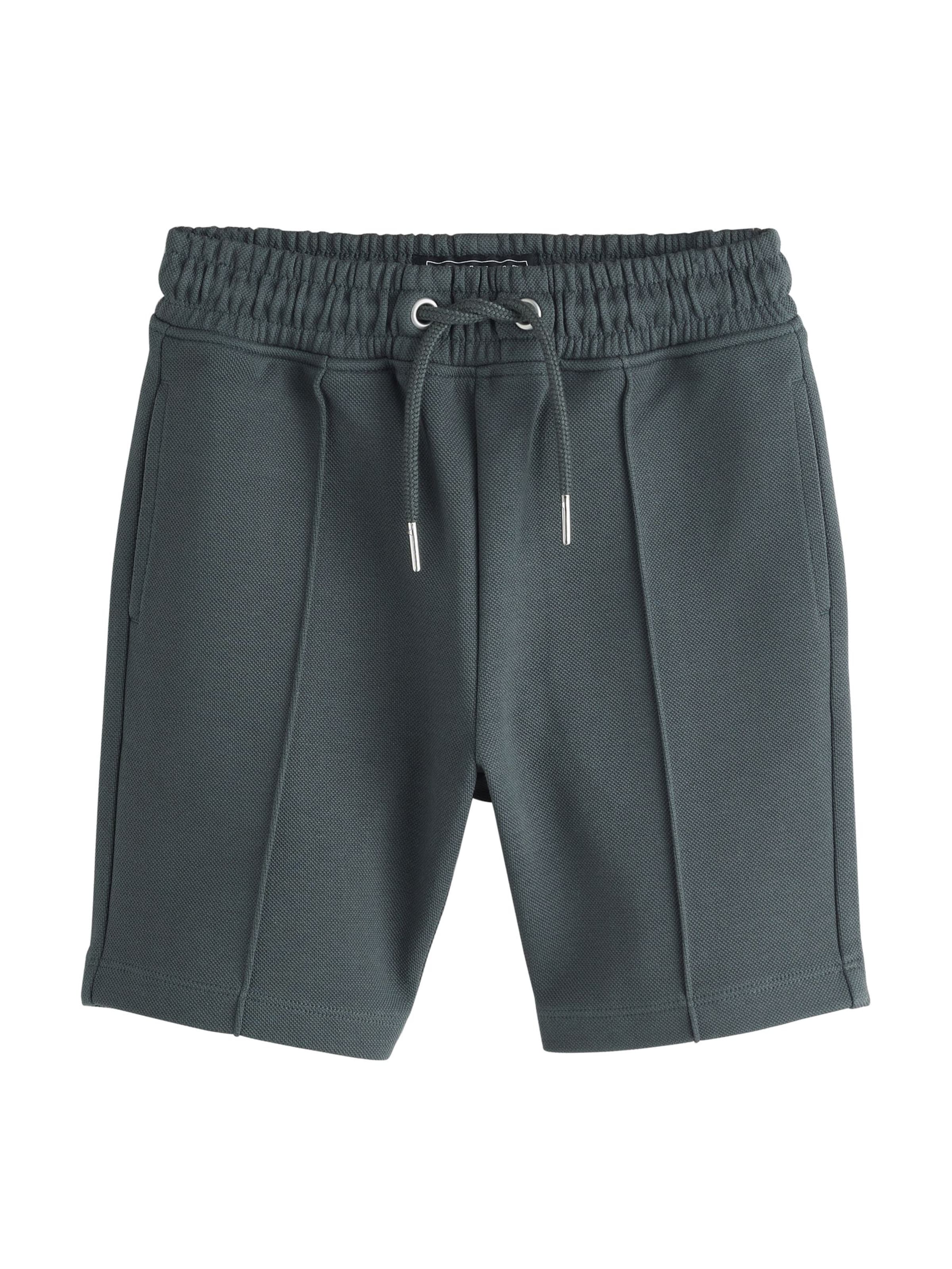 Next Nohavice - Zelená: predná strana