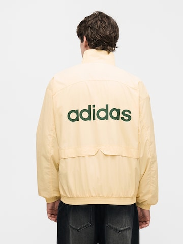 ADIDAS ORIGINALS Between-season jacket 'Munich 93' in Beige: front