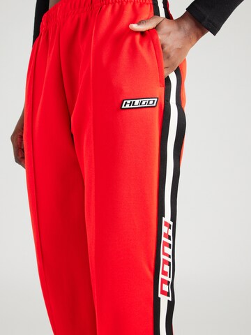 Loosefit Pantaloni 'Necendia' di HUGO in rosso